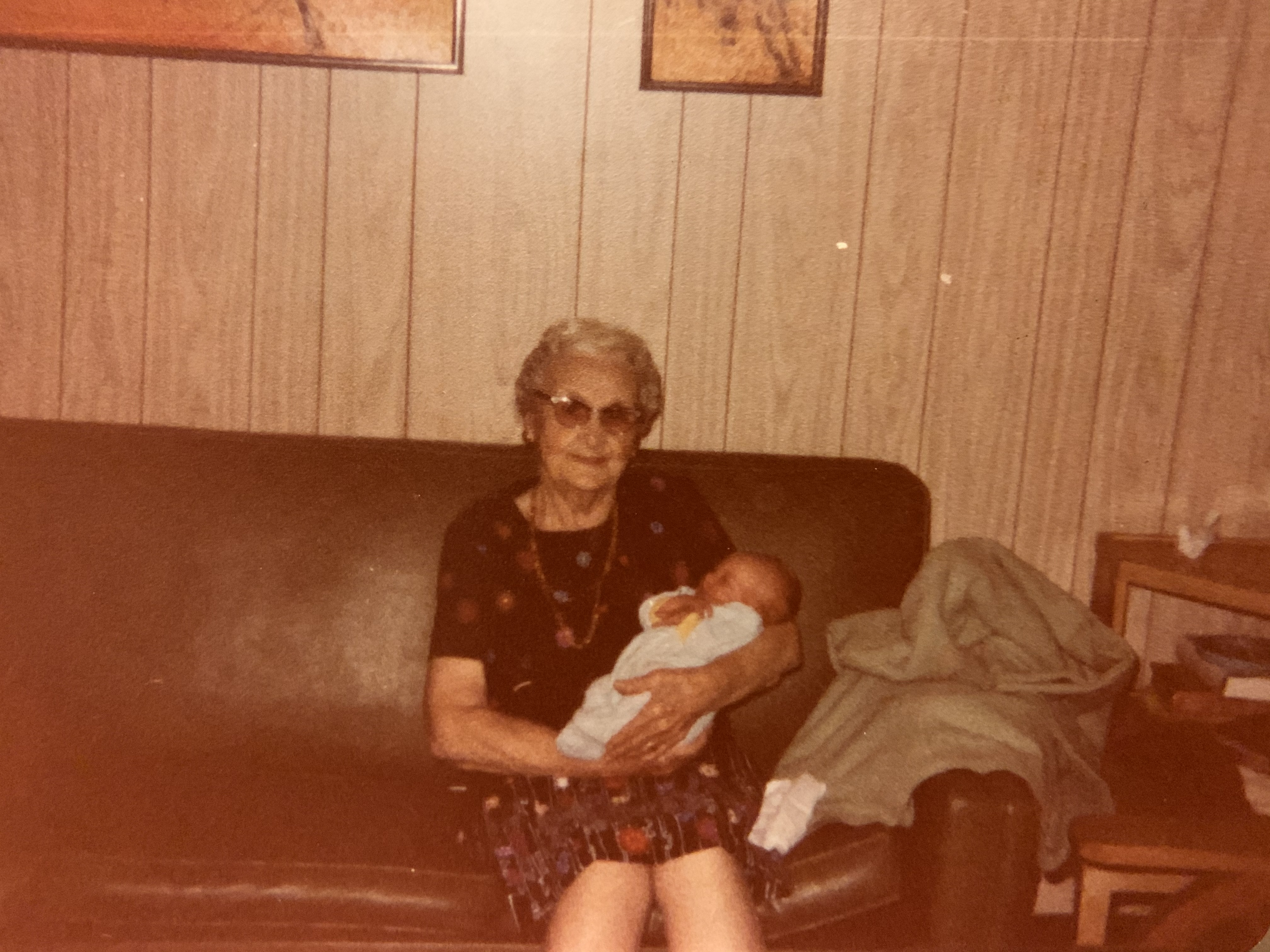 Frances Sample Kellihan holding baby